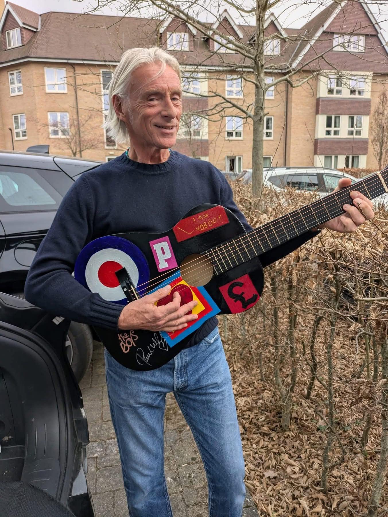 Guitar signed by Paul Weller raises £750 at Wild Woods Garden
